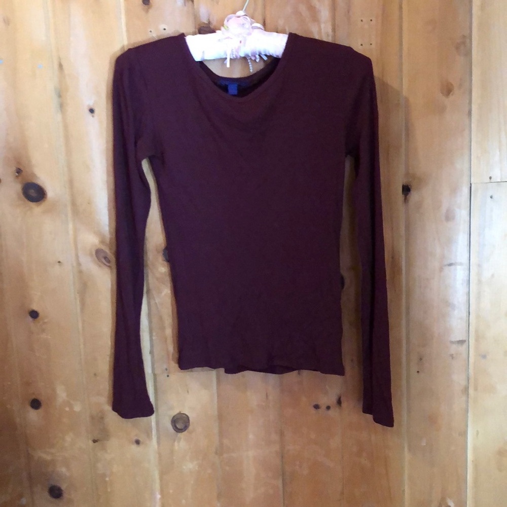 Maroon long sleeved shirt.